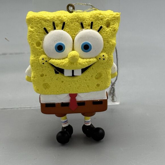 2014 SpongeBob Squarepants Christmas Ornament Viacom Holding Gift Behind Back - Picture 1 of 9
